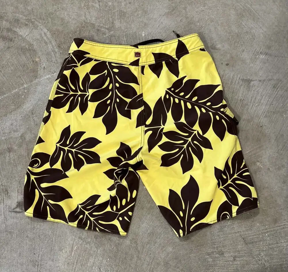 Y2K vintage Quiksilver Men's yellow Hawaiian Boardriding Floral Board Shorts 32”